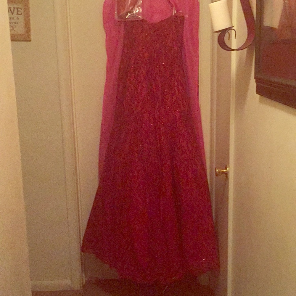 Red beaded prom gown